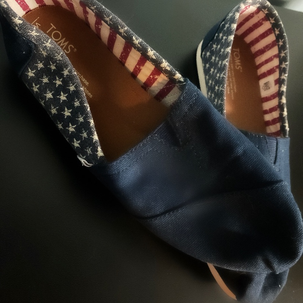 Toms red, white, and blue slip on shoes